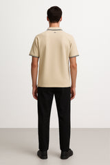 POLO BEIGE CON PLACA